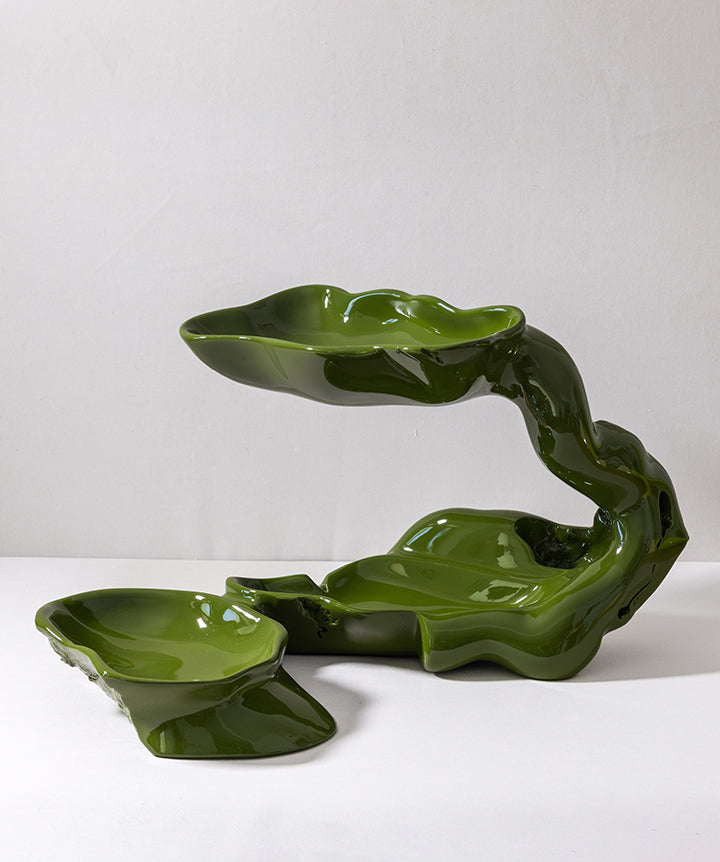 This multi-level wooden piece was found in Georgia and immediately spoke to us as a statement catchall in a league of its own. We smoothed the limbs and interior bowls to bounce and reflect light. This is one of the most spectacular objects we’ve been lucky enough to reimagine.