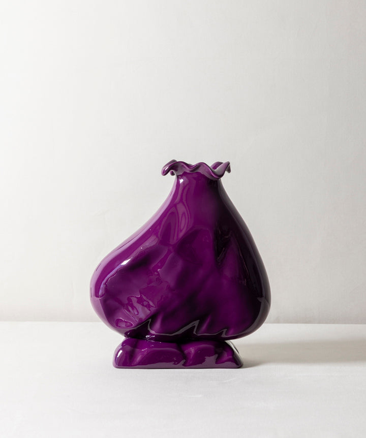 Hand sculpted wood vessel with a voluptuous lower body that narrows as it reaches her feminine neck.
