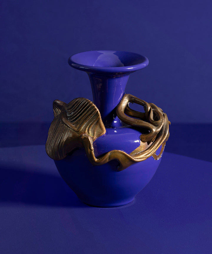 Hand blown glass vase with copper metal leaf overlay. Feels almost dressy, as the copper detail drapes across her body.