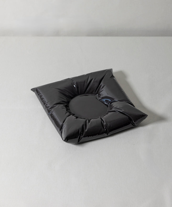 A signature LACKERED catchall made from polymer gypsum. Visually plush, but structured in composition. 