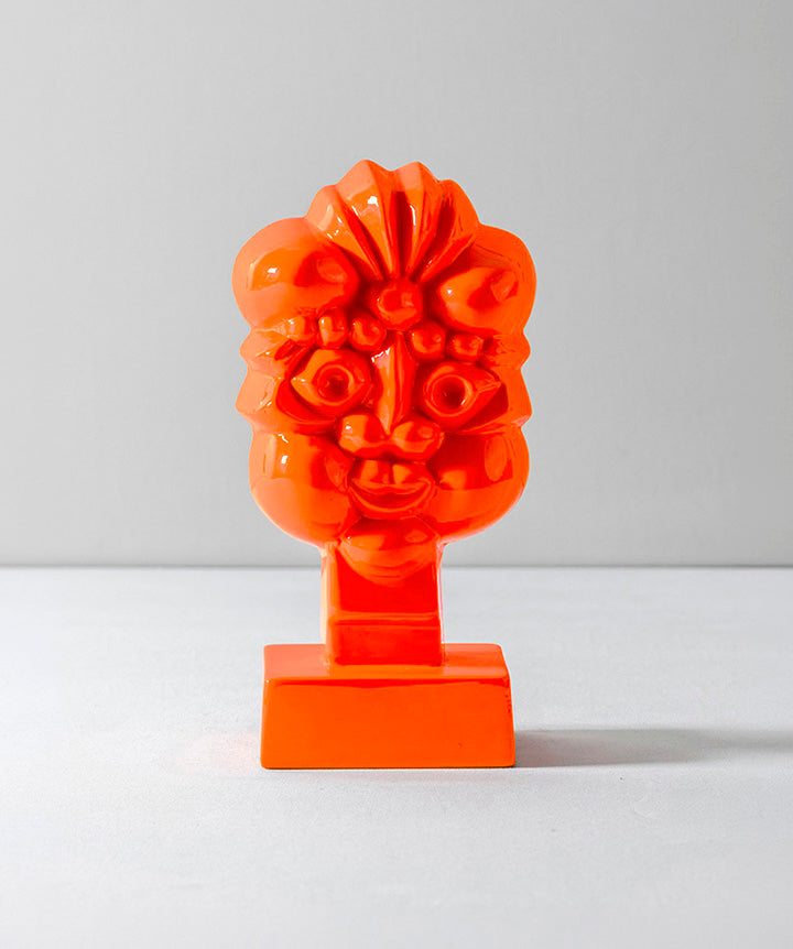 A Muse | Modernist glass face coated in a custom high gloss urethane-based paint and finished in 100% orange wool felt. 