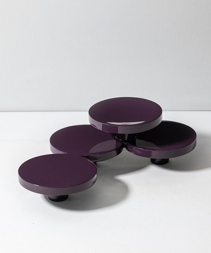 Reunited | Four independent cast iron cylinders that were hand welded together and coated in a custom high gloss urethane-based paint. 