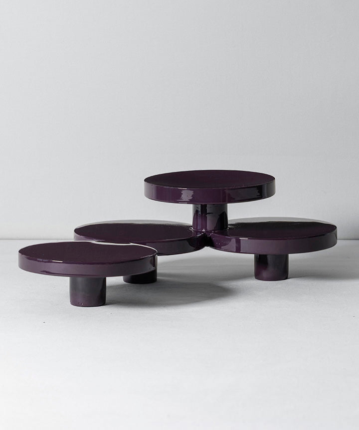 Reunited | Four independent cast iron cylinders that were hand welded together and coated in a custom high gloss urethane-based paint. 