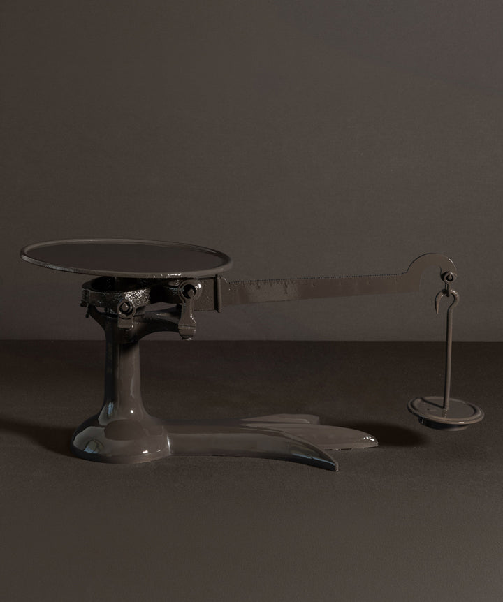 Cast Iron scale. A utilitarian silhouette repurposed into a statement piece that’s playful with a masculine edge. 