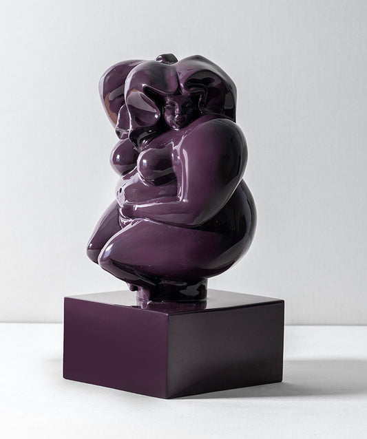 Zaftig Woman | Voluptuous bronze woman on solid marble coated in a custom high gloss urethane-based paint on a white background.