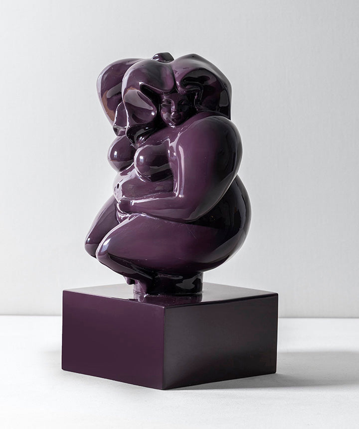 Zaftig Woman | Voluptuous bronze woman on solid marble coated in a custom high gloss urethane-based paint on a white background.