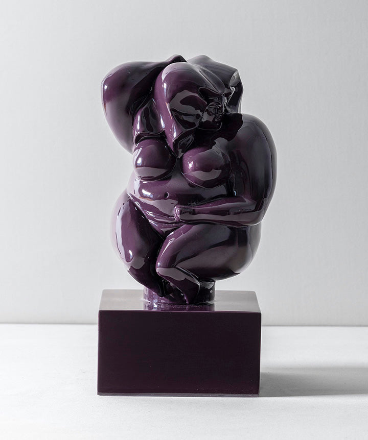 Zaftig Woman | Voluptuous bronze woman on solid marble coated in a custom high gloss urethane-based paint on a white background.